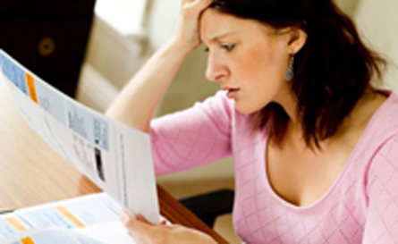 Woman looking at Insurance Info
